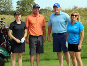 foursome at annual golf for kids outing benefiting work readiness initiative